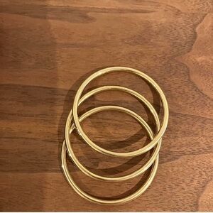 Three gold bangles